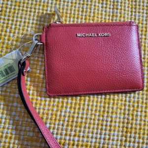 Michael Kors wristlet in Sea Coral